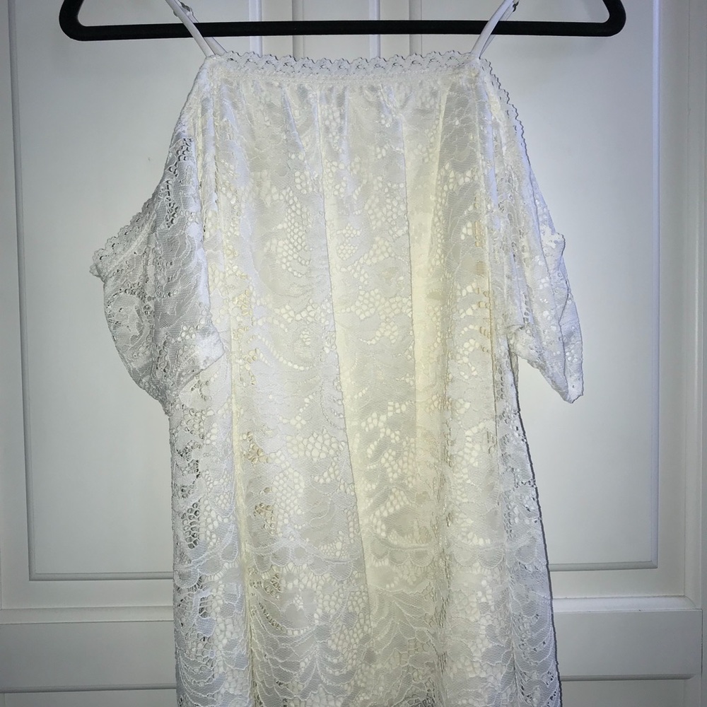 Off the shoulder, cream colored lace top